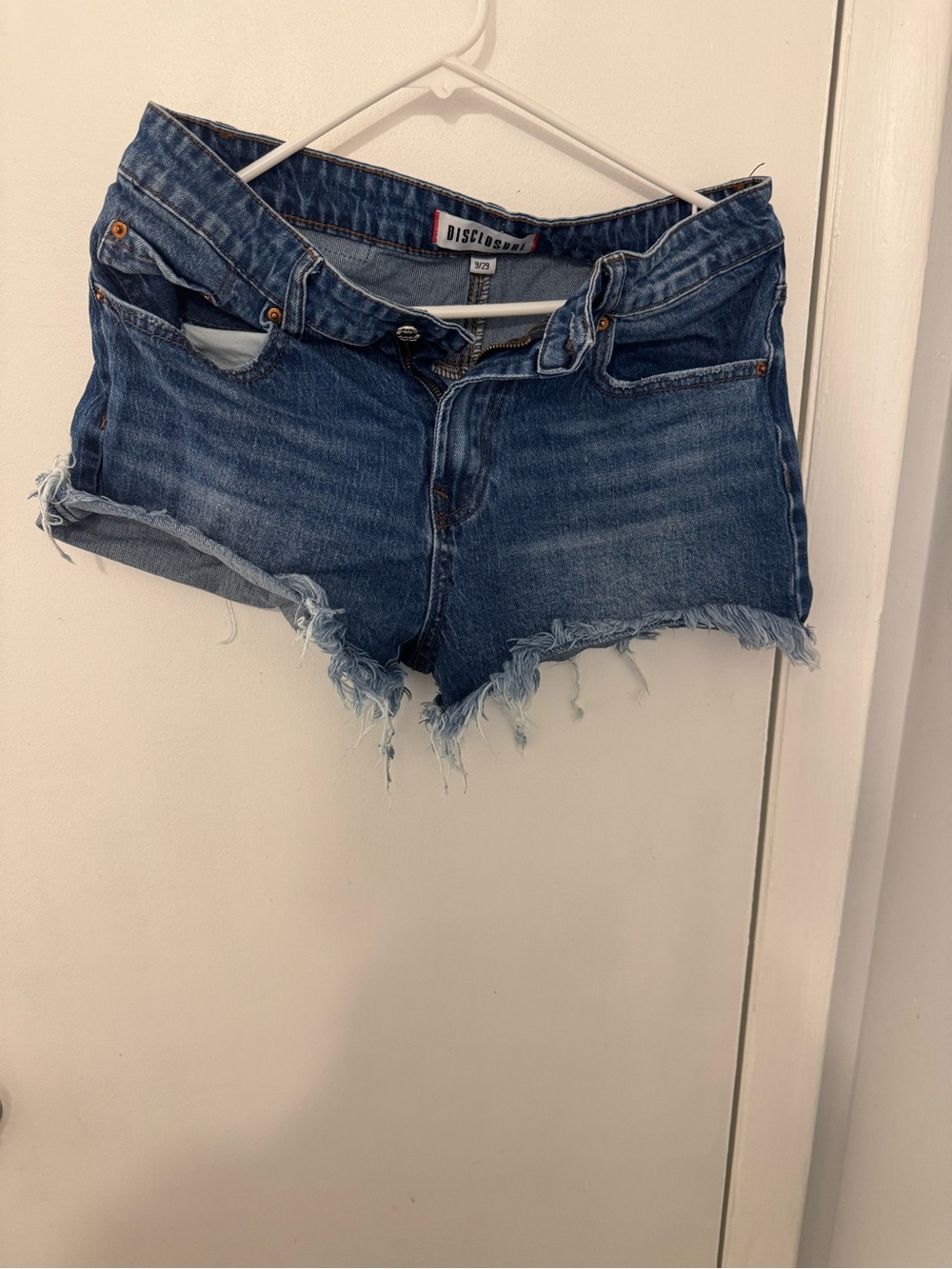 Distressed Blue Denim Cutoff Shorts by